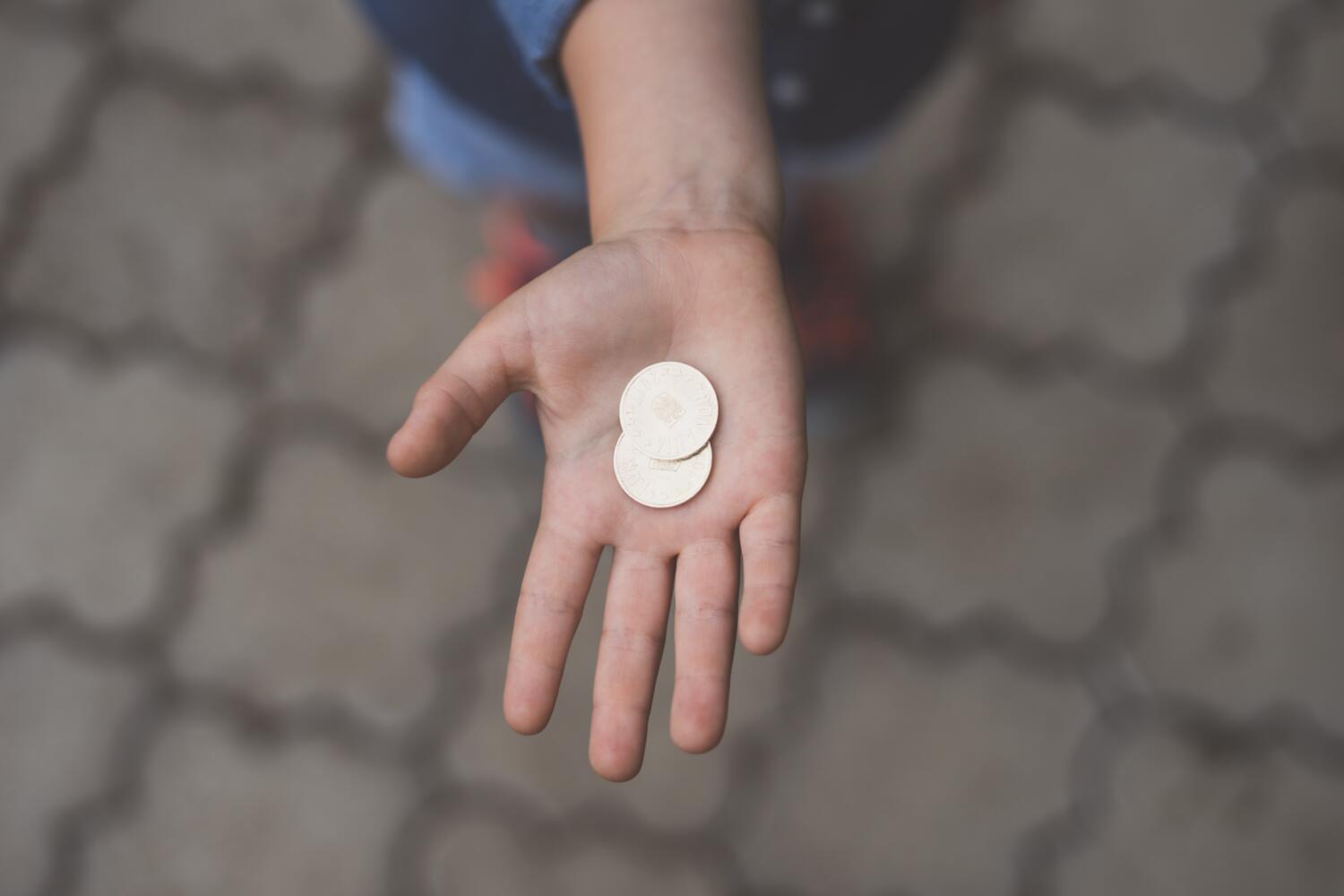 holding coins